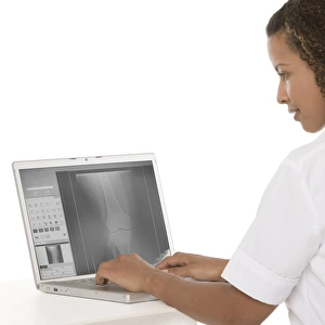 Digital Healthcare Solutions Prints: Nurse using a laptop