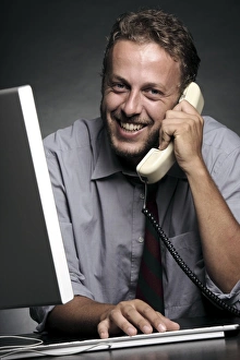 Man Working On Computer Prints: Office worker