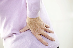 Back Pain Print - Elderly Woman Holding Her Back