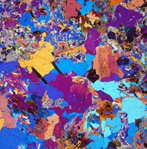 Polarised LM of thin section of granite Polarised LM of thin section of granite
