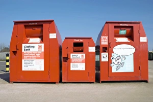 Prints of Recycling centre. Clothing recycling banks either side of a books and music bank, at the Flusco Household Waste Recycling Centre, Cumbria, UK Images Dated 2010 March: Recycling Centre Print: Clothing and Media Recycling Banks