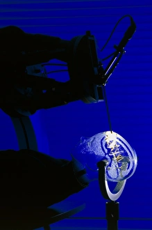 Robot carrying out simulated brain surgery Robot carrying out simulated brain surgery