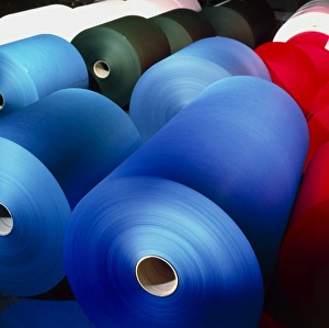Rolls of coloured paper at a paper mill Rolls of coloured paper at a paper mill