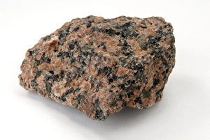 Prints of Sample of granite. Granite is a crystalline intrusive igneous rock consisting of potassium feldspar and quartz with hornblende and mica as common accessory minerals Images Dated 2009 July: Granite Print