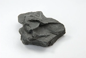 Prints of Sample of shale. Shale is a dense sedimentary rock that forms when layers of mud are buried and compressed. Mud is largely composed of clay particles Images Dated 2009 July: Shale Rock Print