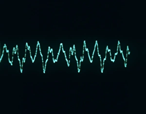 Prints of Sound wave. Oscilloscope trace of a sound wave from a violin. A pure sound wave of a single pitch manifests itself as a sine wave of constant frequency Images Dated 2005 July: A sine wave with subtle irregularities, captured on a print