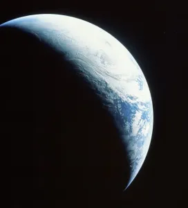 Space Prints: Crescent Earth Print: A photograph of the partially illuminated Earth taken from space