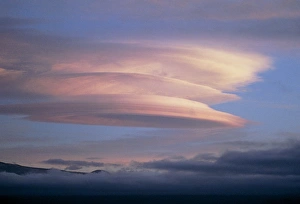 Stack of lenticular clouds over Mauna Kea, Hawaii Stack of lenticular clouds over Mauna Kea, Hawaii