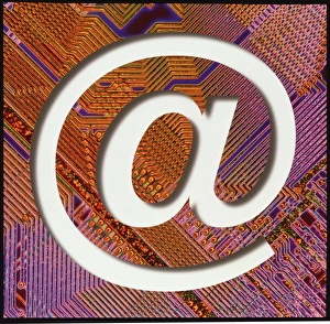 Symbol @ on a chip to represent the internet Symbol @ on a chip to represent the internet