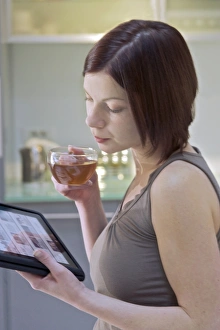 Woman Using Tablet Prints: Tablet computer use C013 / 6039