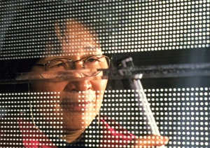 Technician testing a panels sound reflection Technician testing a panels sound reflection
