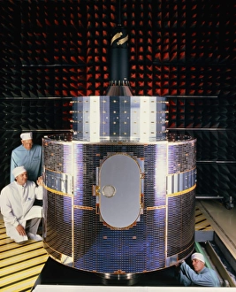 Technicians with Meteosat-6 in test chamber Technicians with Meteosat-6 in test chamber