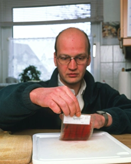 Scientist In Lab Coat Prints: Testing for bacteria