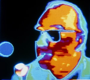 Thermogram of a man smoking a pipe Thermogram of a man smoking a pipe