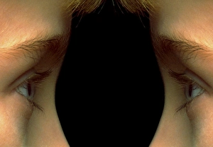 Vision: mirror image of childs face, eye to eye Vision: mirror image of childs face, eye to eye