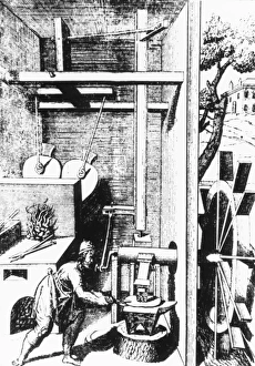 Water wheel powering a hammer and bellows Water wheel powering a hammer and bellows