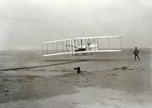 Prints of Photograph of the first powered flight, made by Orville Wright on 17 December 1903 near Kill Devil Hill, Kitty Hawk, North Carolina, USA Wright Brothers Prints: 12-Horsepower Flyer I Print