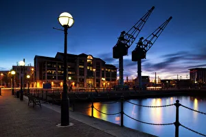 England, Greater Manchester, Salford Quays. Cranes overlooking Ontario Basin part of the recently redeveloped Salford England, Greater Manchester, Salford Quays. Cranes overlooking Ontario Basin part of the recently redeveloped Salford