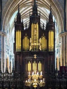 Prints of England, Lincolnshire, Lincoln Cathedral. Detail shot of the interior of Lincoln Cathedral featuring Organ Pipes and Candles Lincolnshire Prints: Lincoln Cathedral Print
