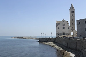 The Adriatic Sea, harbour wall and Cathedral of St. Nicholas the Pilgrim (San Nicola The Adriatic Sea, harbour wall and Cathedral of St. Nicholas the Pilgrim (San Nicola