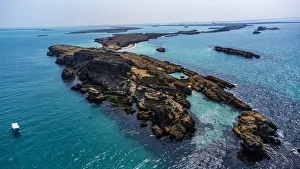 Aerial of a little boat in the Farasan islands, Kingdom of Saudi Arabia, Middle East Aerial of a little boat in the Farasan islands, Kingdom of Saudi Arabia, Middle East