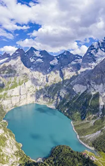 Aerial panoramic of alpine Oeschinensee lake, Bernese Oberland, Kandersteg, Canton Aerial panoramic of alpine Oeschinensee lake, Bernese Oberland, Kandersteg, Canton
