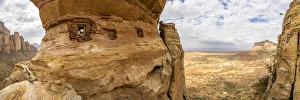 Aerial panoramic by drone of priest looking out from Abuna Yemata Guh rock-hewn church Aerial panoramic by drone of priest looking out from Abuna Yemata Guh rock-hewn church