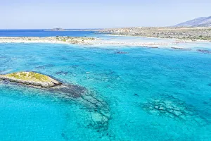 Aerial view of the blue sea surrounding Elafonisi beach, Crete island, Greek Islands, Greece, Europe Aerial view of the blue sea surrounding Elafonisi beach, Crete island, Greek Islands, Greece, Europe