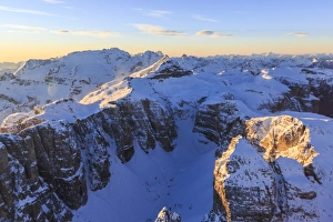 Aerial view of Boe Peak and Marmolada Group at sunset, Sella Group, Dolomites Aerial view of Boe Peak and Marmolada Group at sunset, Sella Group, Dolomites