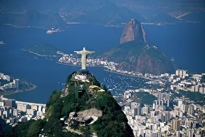Aerial view of city with the Cristo Redentor (Christ the Redeemer) statue in foreground Aerial view of city with the Cristo Redentor (Christ the Redeemer) statue in foreground