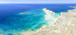Aerial view of the exotic Elafonisi beach set along an island lagoon, Crete island, Greek Islands, Greece, Europe Aerial view of the exotic Elafonisi beach set along an island lagoon, Crete island, Greek Islands, Greece, Europe