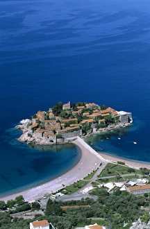 Aerial view over island and sandbar, Sveti Stefan, The Budva Riviera, Montenegro, Europe Aerial view over island and sandbar, Sveti Stefan, The Budva Riviera, Montenegro, Europe