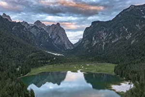 Aerial view of mountains reflected in lake Dobbiaco at sunset, Dobbiaco (Toblach) Aerial view of mountains reflected in lake Dobbiaco at sunset, Dobbiaco (Toblach)