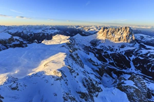Aerial view of Sassolungo at sunset, Sella Group, Dolomites, Trentino-Alto Adige Aerial view of Sassolungo at sunset, Sella Group, Dolomites, Trentino-Alto Adige