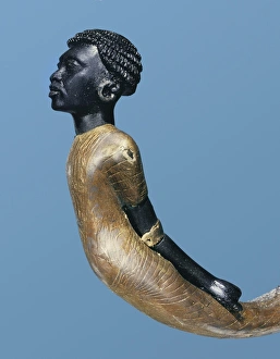 An African adversary carved on the lower end of a ceremonial cane, from the tomb of the pharaoh Tutankhamun An African adversary carved on the lower end of a ceremonial cane, from the tomb of the pharaoh Tutankhamun