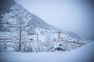 Alpine village in a white winter landscape after snowfall, Gerola Alta, Valgerola Alpine village in a white winter landscape after snowfall, Gerola Alta, Valgerola