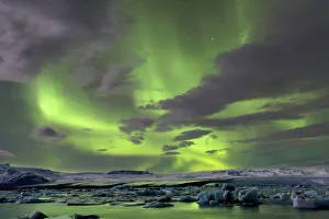 The Aurora Borealis (Northern Lights) captured in the night sky over Jokulsarlon glacial The Aurora Borealis (Northern Lights) captured in the night sky over Jokulsarlon glacial