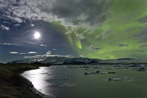 The Aurora Borealis (Northern Lights) captured in the night sky over Jokulsarlon glacial The Aurora Borealis (Northern Lights) captured in the night sky over Jokulsarlon glacial