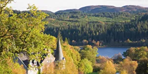 Autumn view to Loch Achray from wooded hillside above the former Trossachs Hotel Autumn view to Loch Achray from wooded hillside above the former Trossachs Hotel