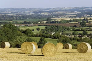 English Countryside Scenery Prints: Bales of hay with Chipping Campden beyond, from the Cotswolds Way footpath
