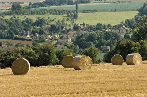 English Countryside Scenery Prints: Bales of hay with Chipping Campden beyond, from the Cotswolds Way footpath