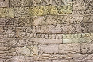 Bas-relief stone carvings depicting a sea battle, Banteay Chhmar, Ankorian-era temple ruins Bas-relief stone carvings depicting a sea battle, Banteay Chhmar, Ankorian-era temple ruins