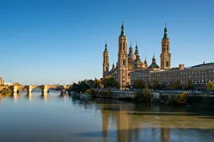 Basilica del Pilar Cathedral with stone bridge crossing Ebro River, Zaragoza, Aragon, Spain, Europe Basilica del Pilar Cathedral with stone bridge crossing Ebro River, Zaragoza, Aragon, Spain, Europe