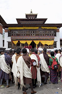 Bhutanese men in traditional dress, Buddhist festival (Tsechu), Trashi Chhoe Dzong Bhutanese men in traditional dress, Buddhist festival (Tsechu), Trashi Chhoe Dzong