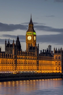 Big Ben clock tower stands above the Houses of Parliament at dusk, UNESCO World Heritage Site, Westminster, London Big Ben clock tower stands above the Houses of Parliament at dusk, UNESCO World Heritage Site, Westminster, London