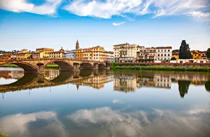 Bridge reflected in the River Arno Print