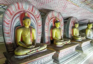 Dambulla Cave Temple Prints: Buddha figures inside Dambulla cave Buddhist temple complex
