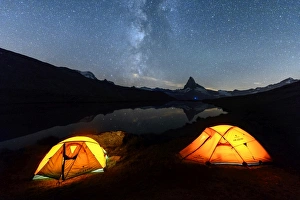 Camping under the stars with Matterhorn reflected in Lake Stellisee, Zermatt, Canton of Valais Camping under the stars with Matterhorn reflected in Lake Stellisee, Zermatt, Canton of Valais