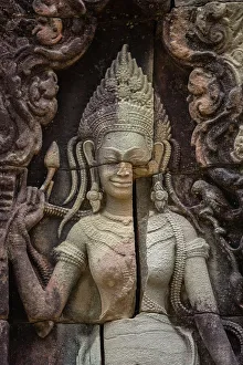 Angkor Wat Temples Prints: Detail of the carved facade at one of the temples in Angkor Wat complex