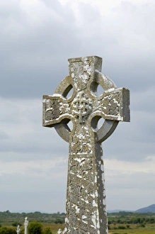 Celtic Cross Ireland Prints: Celtic style cross in graveyard
